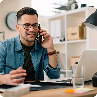A professional male on the phone